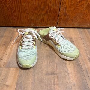 Green Olukai sneakers